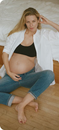 Hatch - pregnant woman next to bed