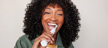 Burst photo of woman brushing teeth