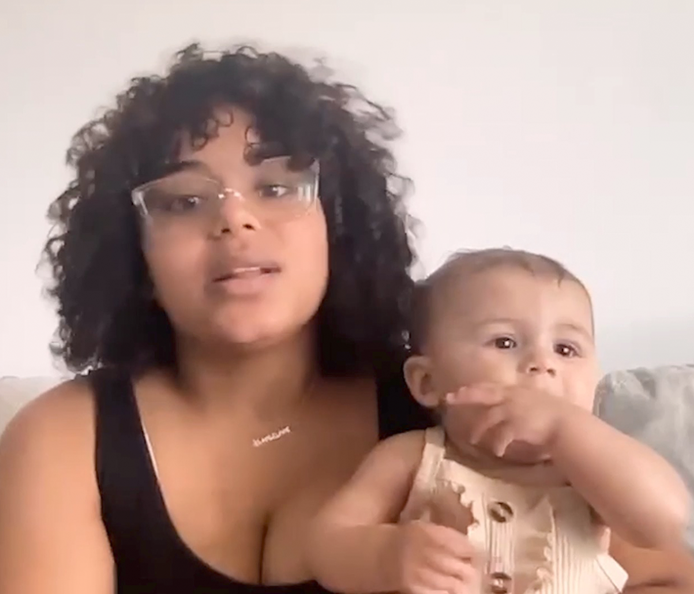 Mom and daughter facing the camera