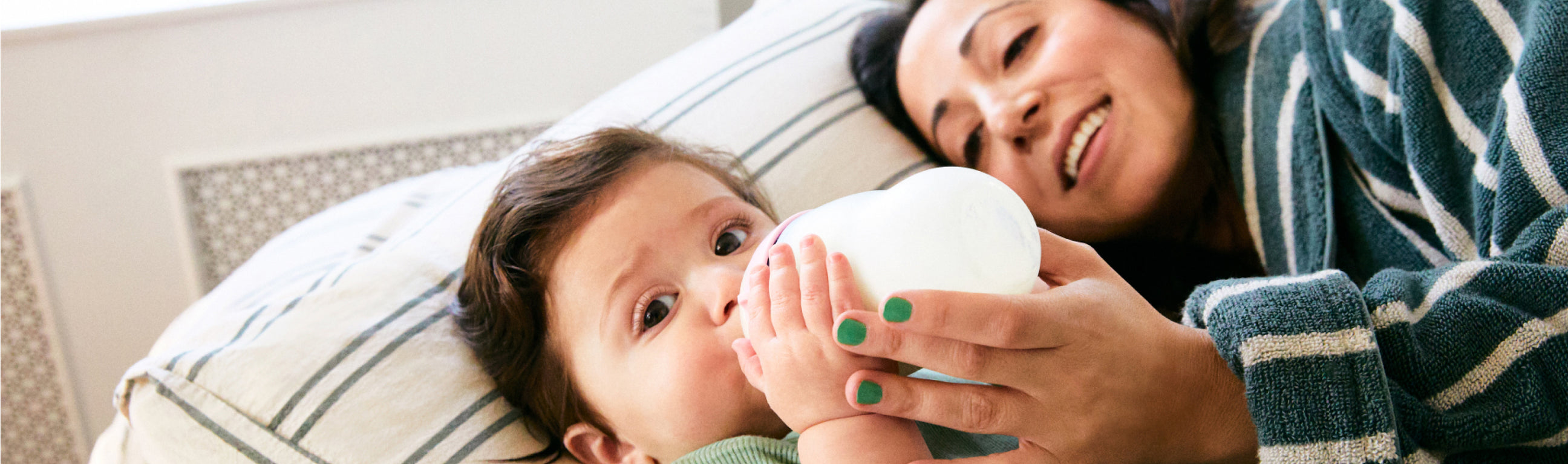a baby drinking from a bottle